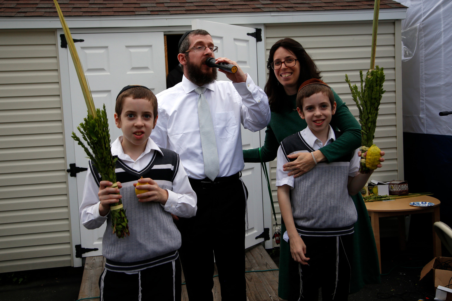 The Kramers and their sons led Simchat Torah festivities this year at the Chabad Center.