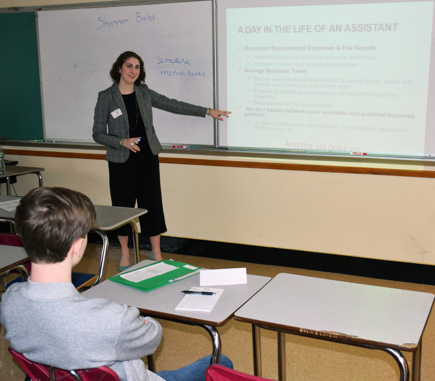 W.T. Clarke High School alumna Shannon Bales shared her experience as a fashion executive assistant with students during the school’s first Career Day.