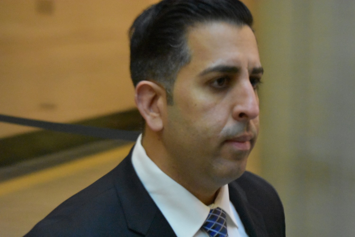 Rockville Centre Police Officer Anthony Federico walked out of the courtroom at the Nassau County Courthouse in Mineola on Wednesday after Day One of his trial wrapped up.