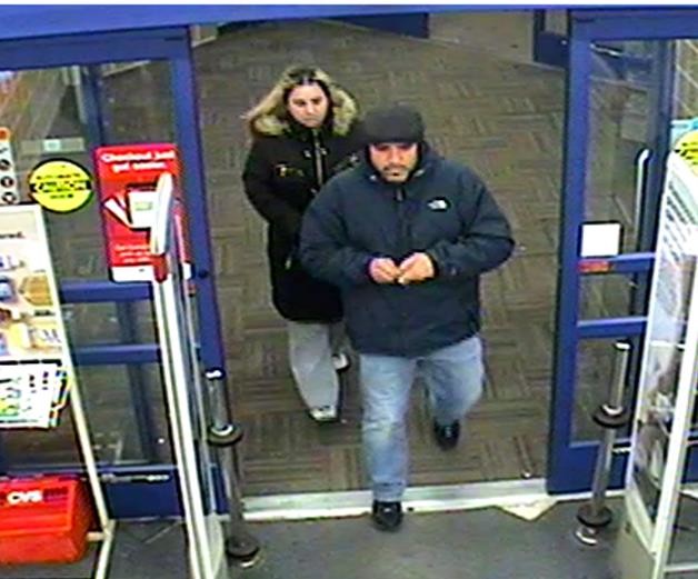 This man and woman are suspects in a string of car burglaries. They were seen entering CVS in Baldwin, where they allegedly used a credit card that they had stolen from a car parked in the lot behind Maple Avenue on Wednesday evening.