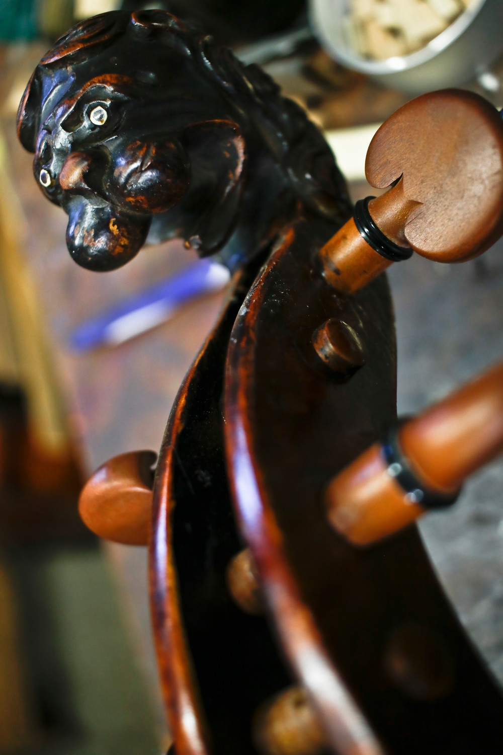 A Stainer Cello from the 1700s was the only one in the shop, with a uniquely carved lion’s head scroll.