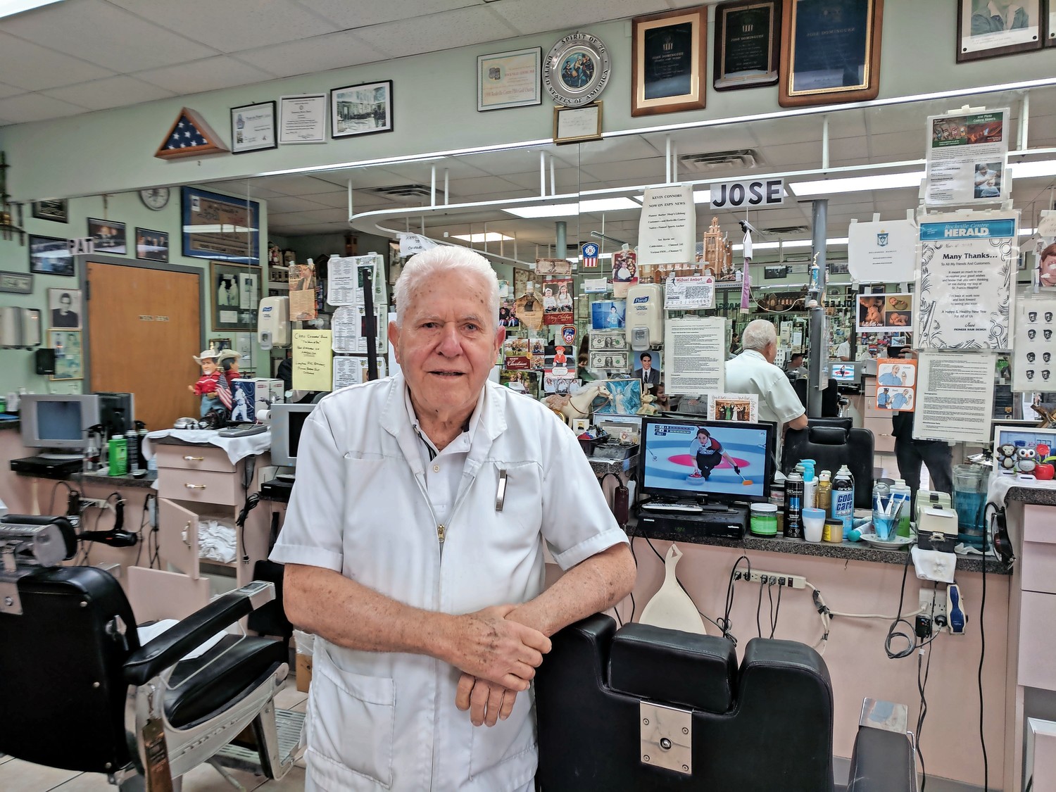 Jose Dominguez came to Rockville Centre from Cuba 50 years ago, and has spent those decades cutting hair for customers.