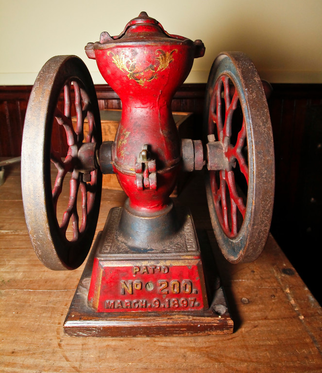 A historic coffee grinder.