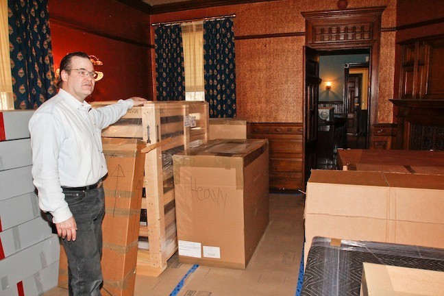 April 4, 2015. The Dining Room is full of boxes that were recently shipped back from Massachusettes. George Hagerty speaks about the special containers that were used which he had to build to ship some of the more fragile items.