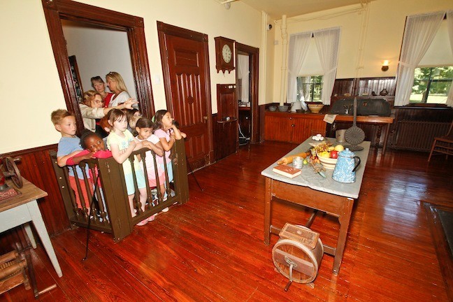 The students visit the Kitchen during their tour.