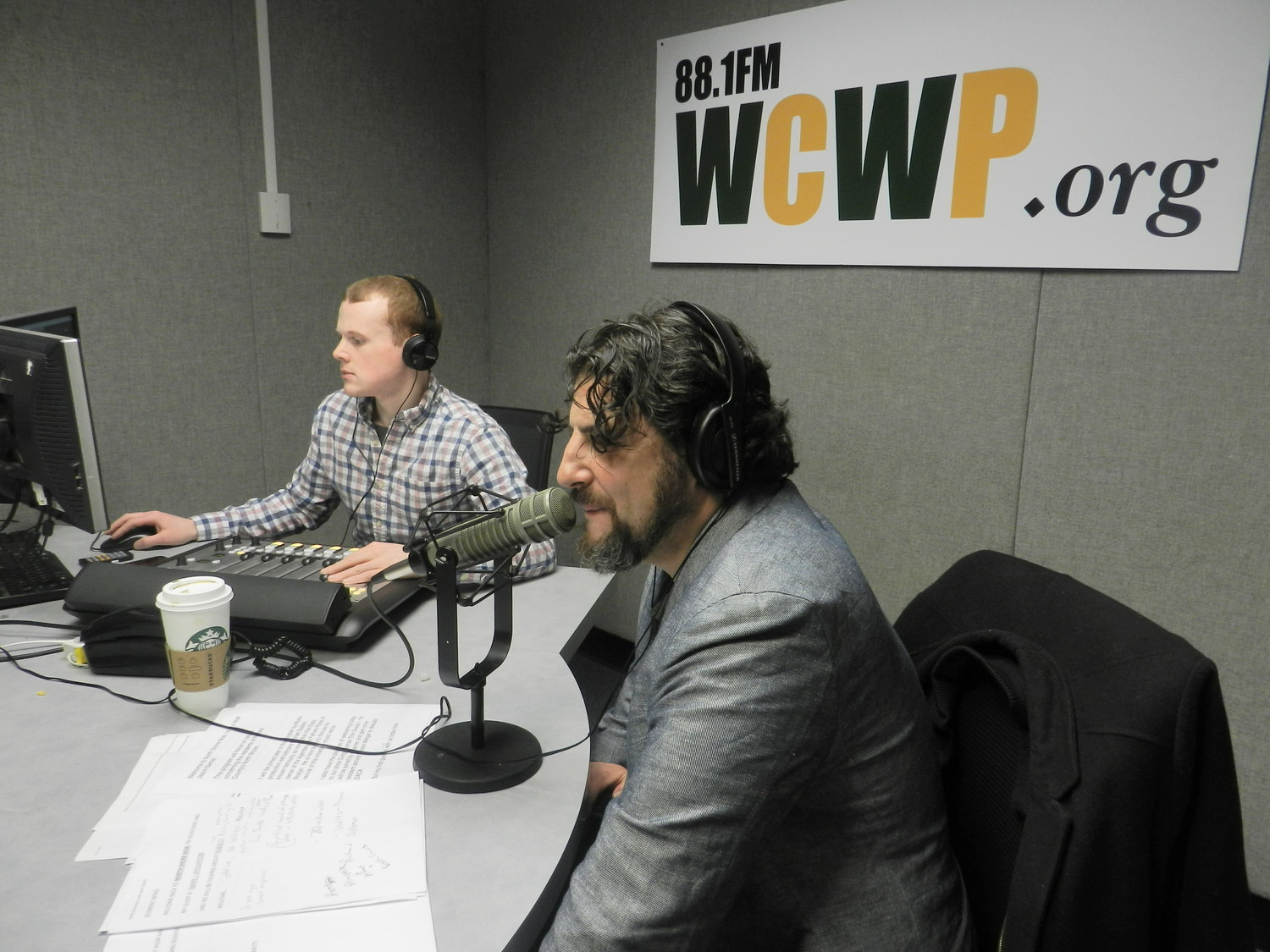Jason Samel, a resident of Old Brookville, pre-records his interviews in the studio at WCWP on LIU Post’s campus.