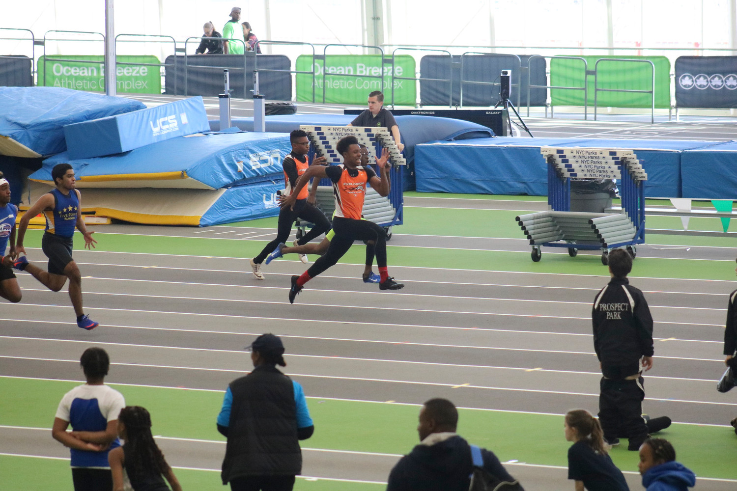 Two runners from Explosion Track Club, Andrew Decoteau and Julian Desrosiers, competing at a recent meet.