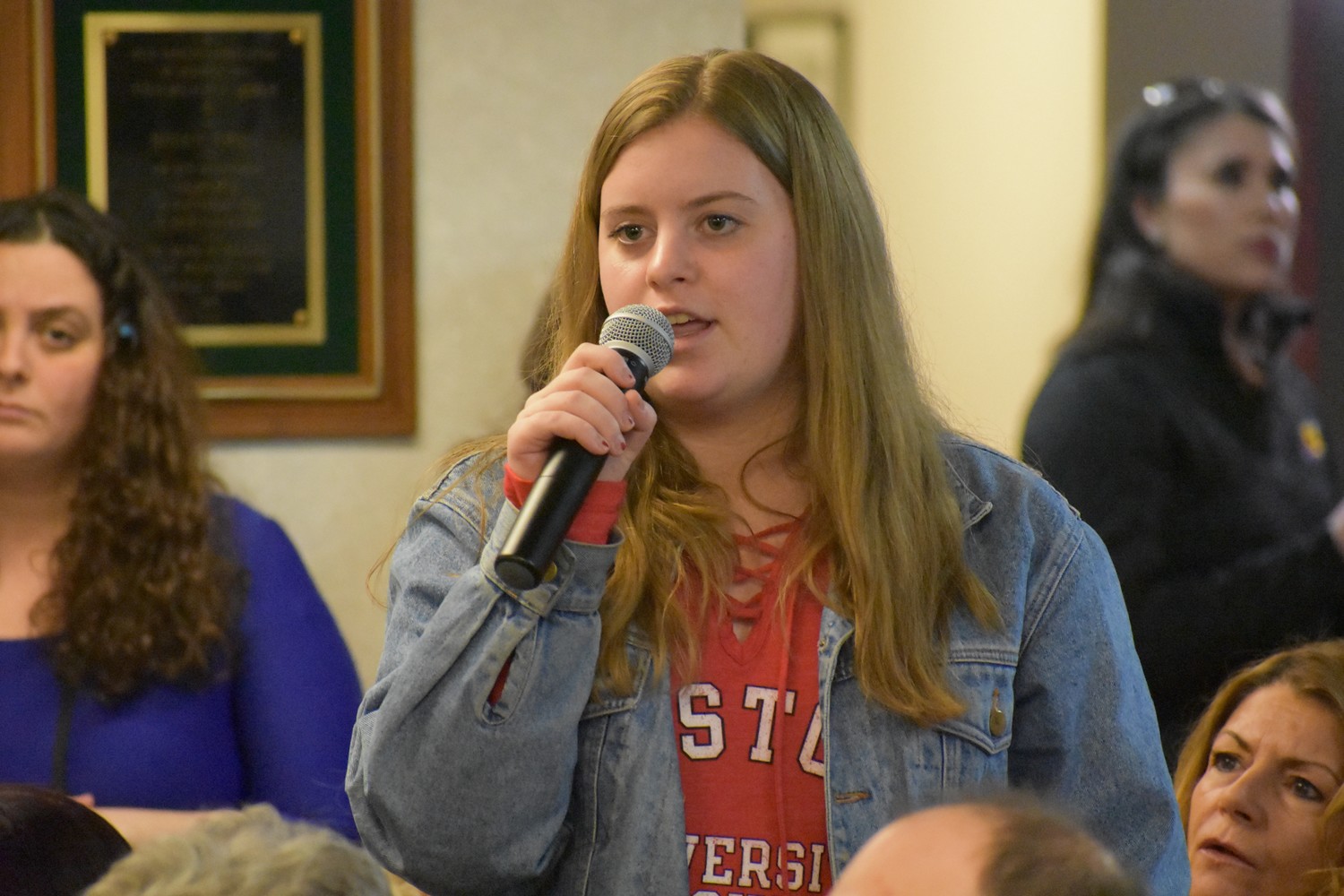 Julia Baxley, a senior at South Side High School, urged adults and teenagers to share their perspectives on school safety.