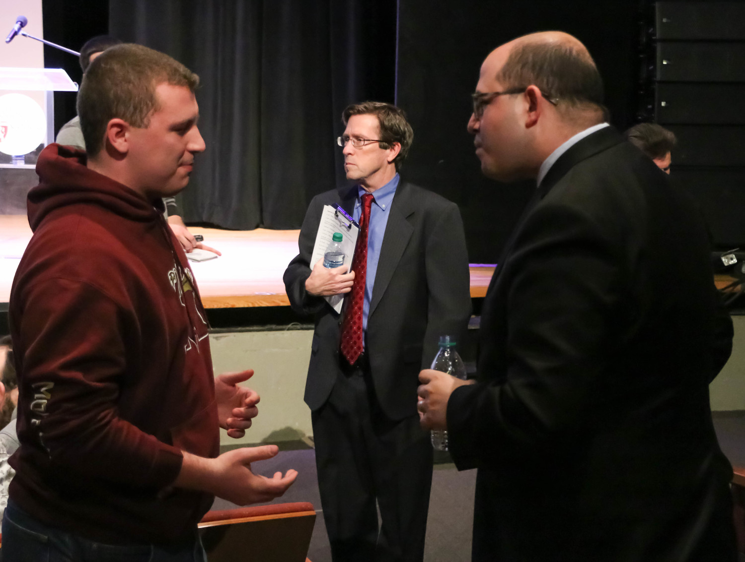 Lou Mazza, left, a freshman at Molloy College, spoke with Stelter after calling him out for having a liberal agenda.