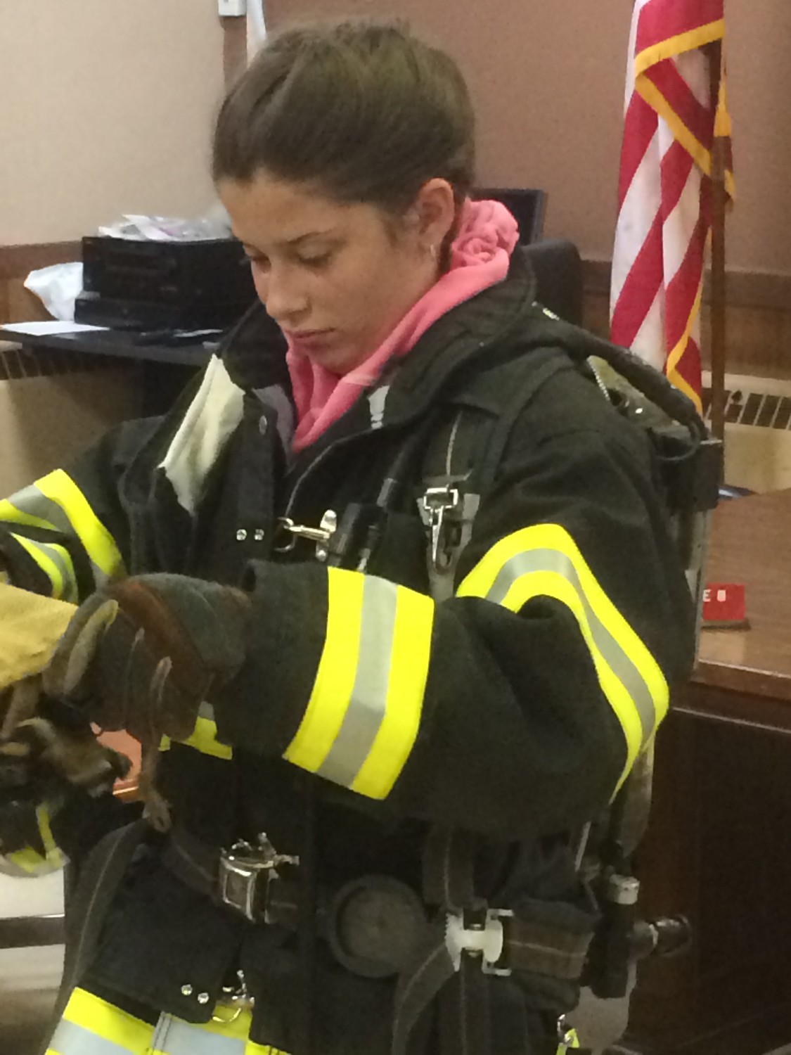 Erika Brancato tried on official firefighter gear at her first training session with the Rockville Centre Junior Fire Department in 2015.