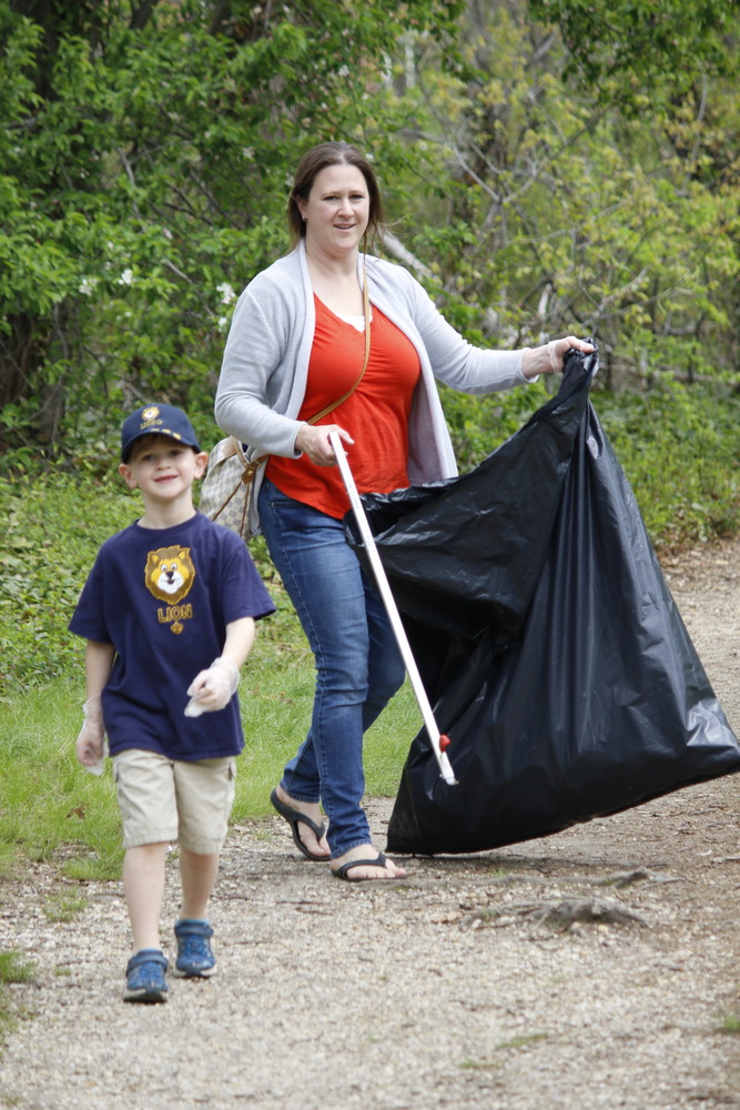 Lion Scout Nicholas Pellegrino, of Wantagh, wanted to stay and clean up every last path of Twin Lakes Preserve. His mother, Kate, assured him that they can come back whenever he wants to pick up trash.