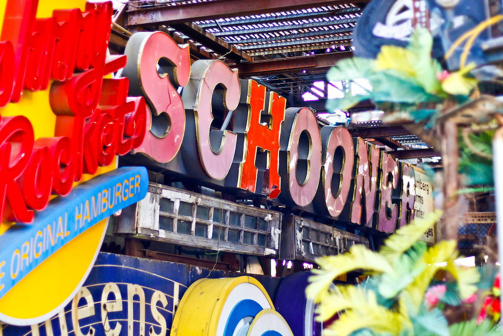 The old Schooner restaurant sign found a home among others at the yard.