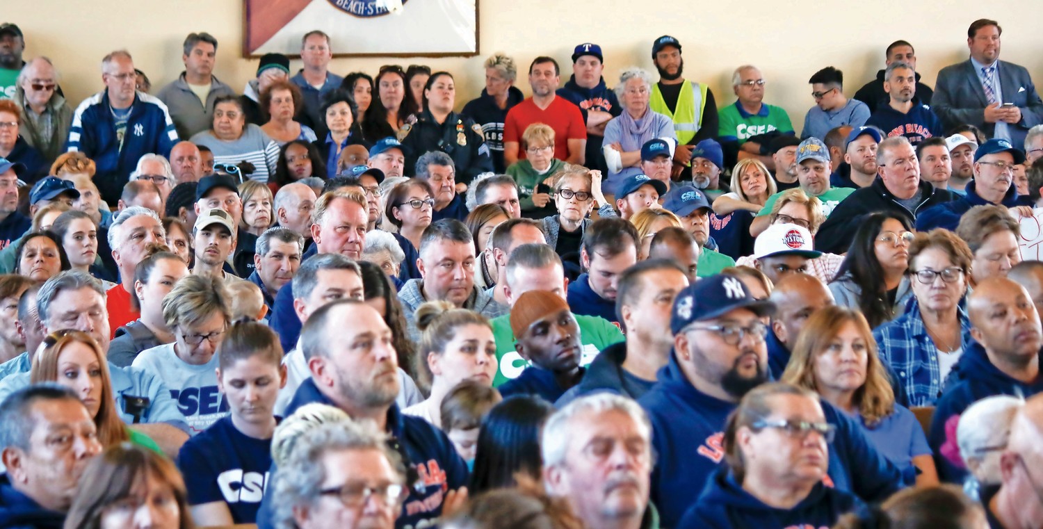 Hundreds of residents and union members packed City Hall on May 1, the first of three budget meetings, where they criticized proposed layoffs and a 12.3 percent tax increase.