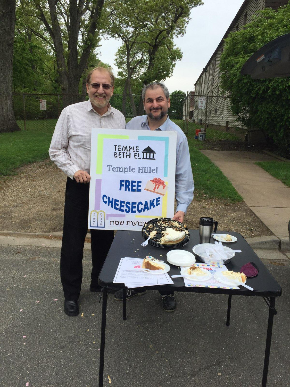 Temple Hillel spiritual leader Rabbi Steven Graber, left, and Rabbi Claudio Kupchik of Temple Beth-El, served cheese cake and spoke to Hewlett High students about the Jewish holiday of Shavuot.