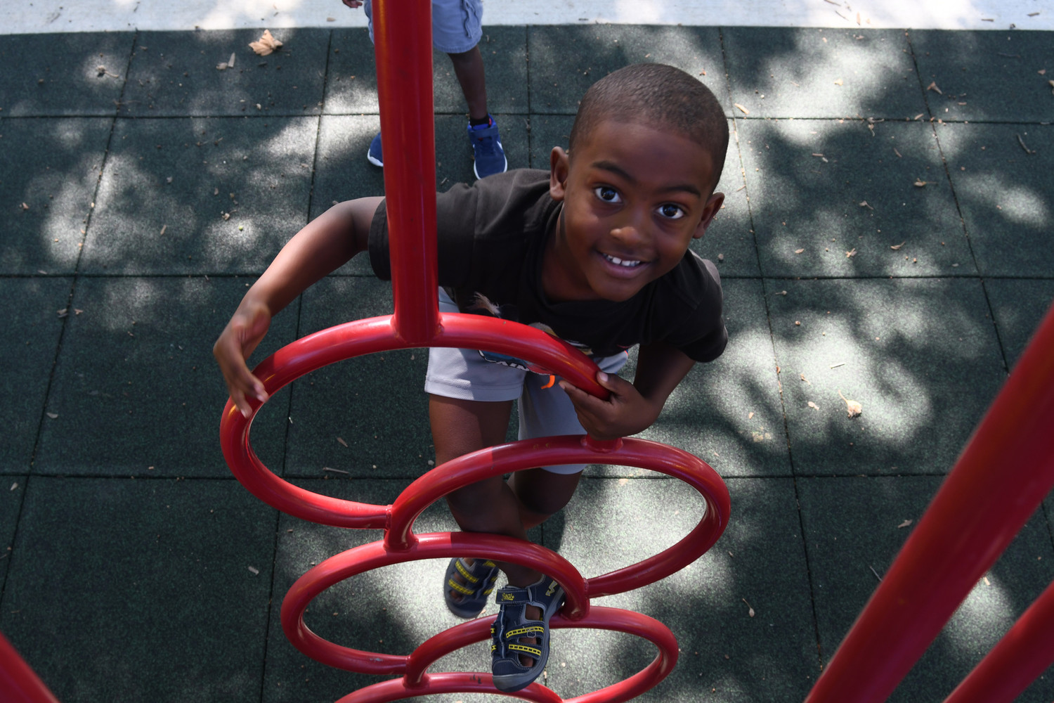 Kaleb Suchit, 5, helped break in a new playground at Greis Park when it opened last summer. Village officials are accepting bids for a master plan to redevelop the park.
