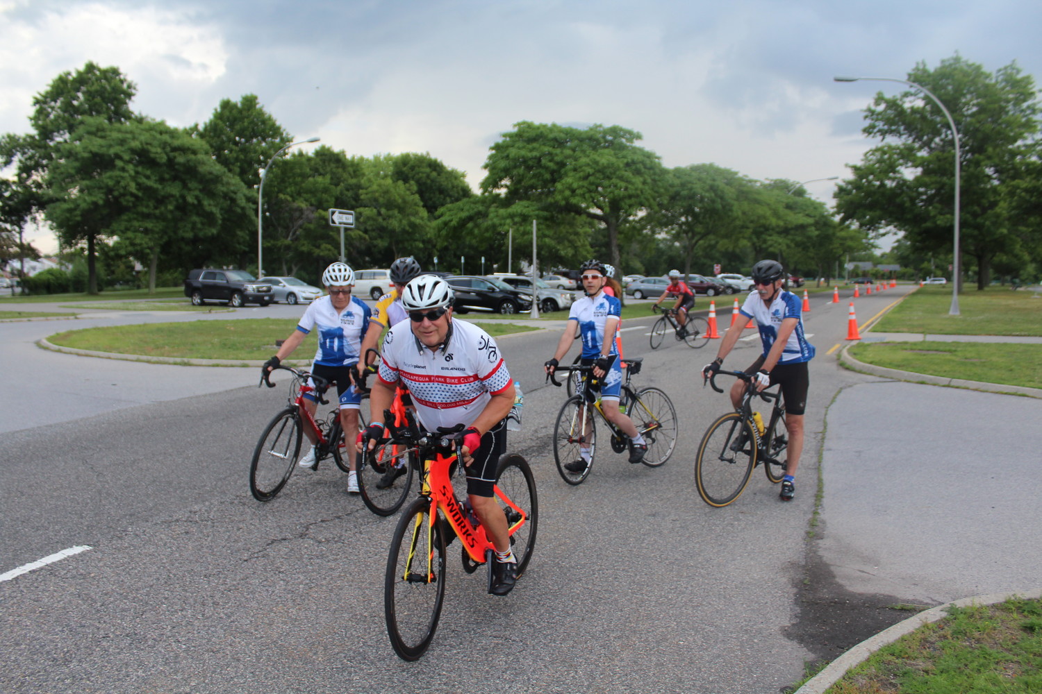 James Matone/Herald-Citizen
Phil Kingsbury, in front, began his 24-hour bike ride on June 28 at 6 p.m. with some local cyclists. A few miles into his journey, the skies opened up, forcing him and his crew to ride through the rain.
