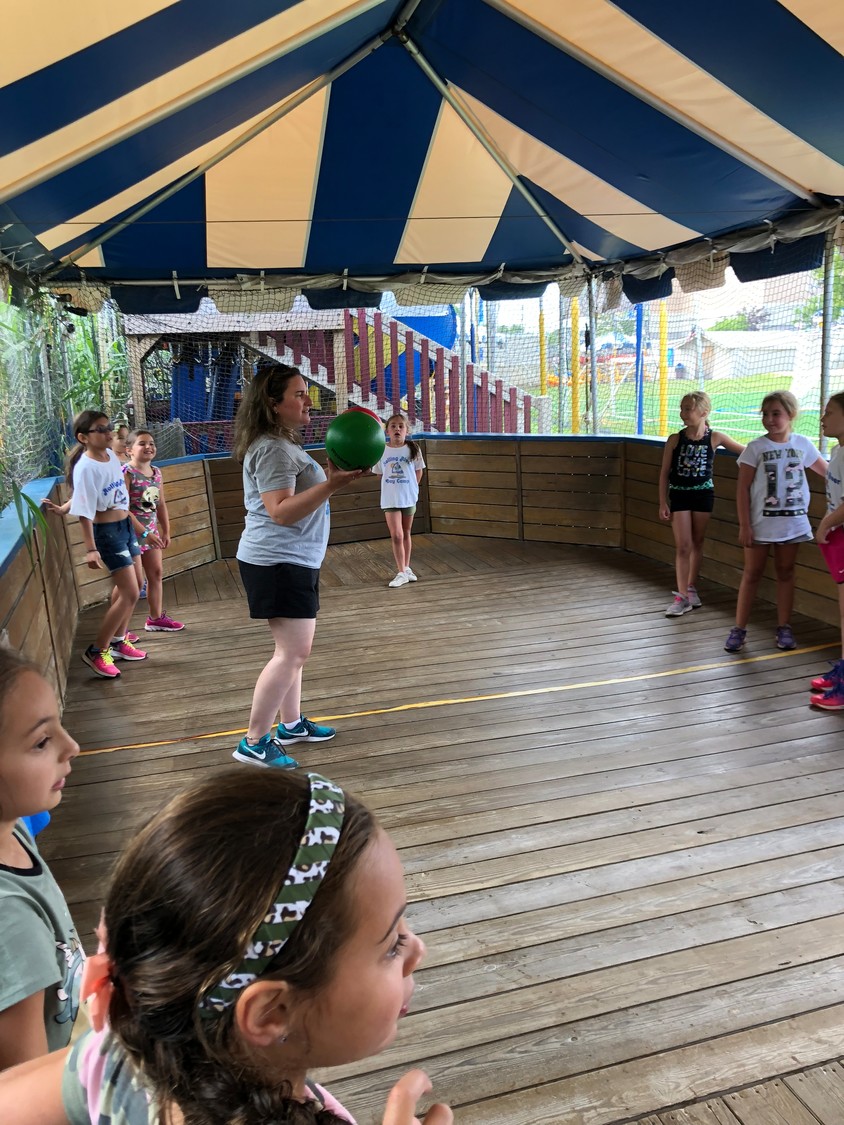 G7 Snappers head counselor Michelle Perlmutter, center, led her campers in a game.