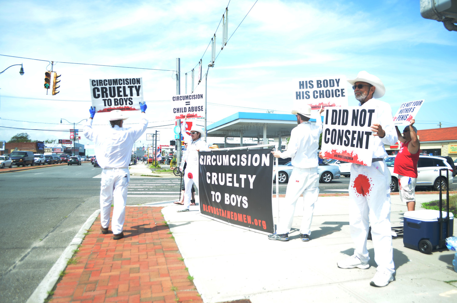 Protesters on East Park Avenue and Long Beach Boulevard denounced the practice of circumcision.