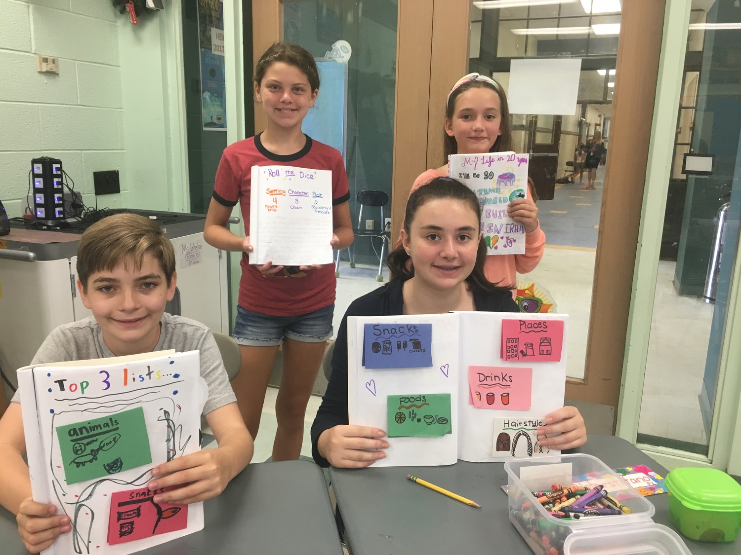 Students proudly displayed their journals that they worked on in a class called Write On.