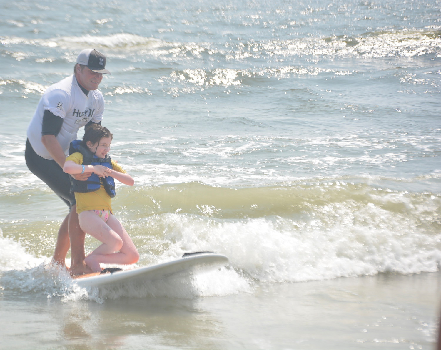 Teadora Wollemberg experienced the thrill of surfing with instructor Cliff Skudin.