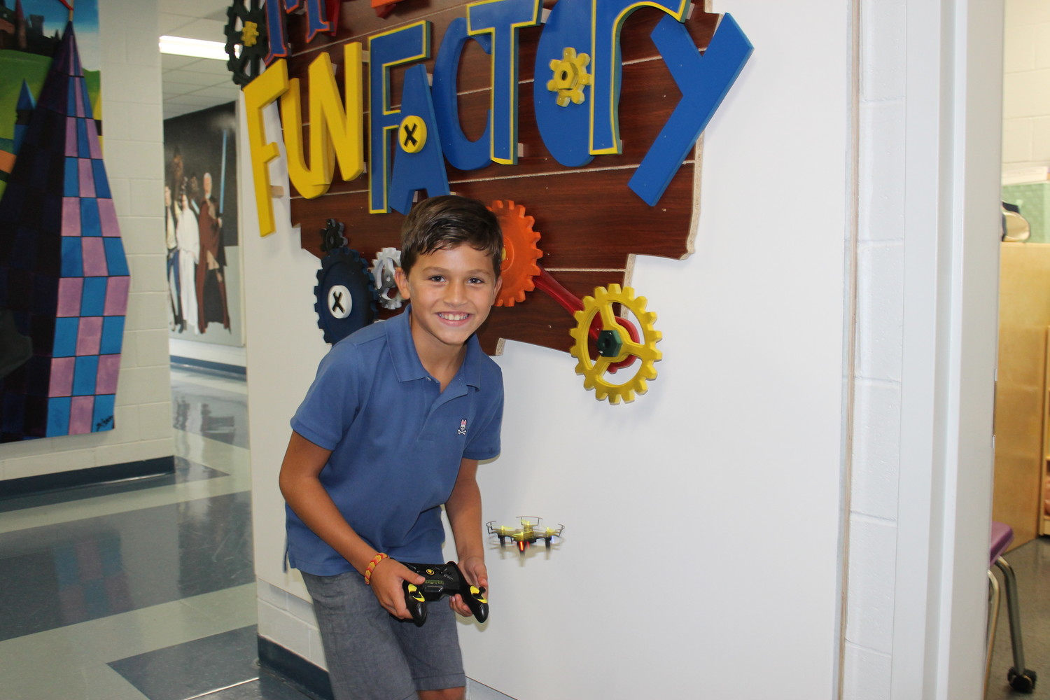 Fifth-grader Lucas DiMarco, above, flew an indoor drone.