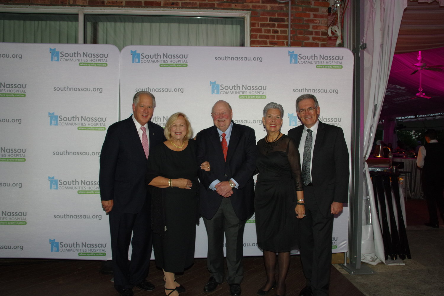 South Nassau Communities Hospital Board Vice Chairman Tony Cancellieri, top left, his wife, Marylou, soirée co-honoree and hospital board Chairman Joseph Fennessy and hospital board member Wayne Lipton with his wife, Karen.