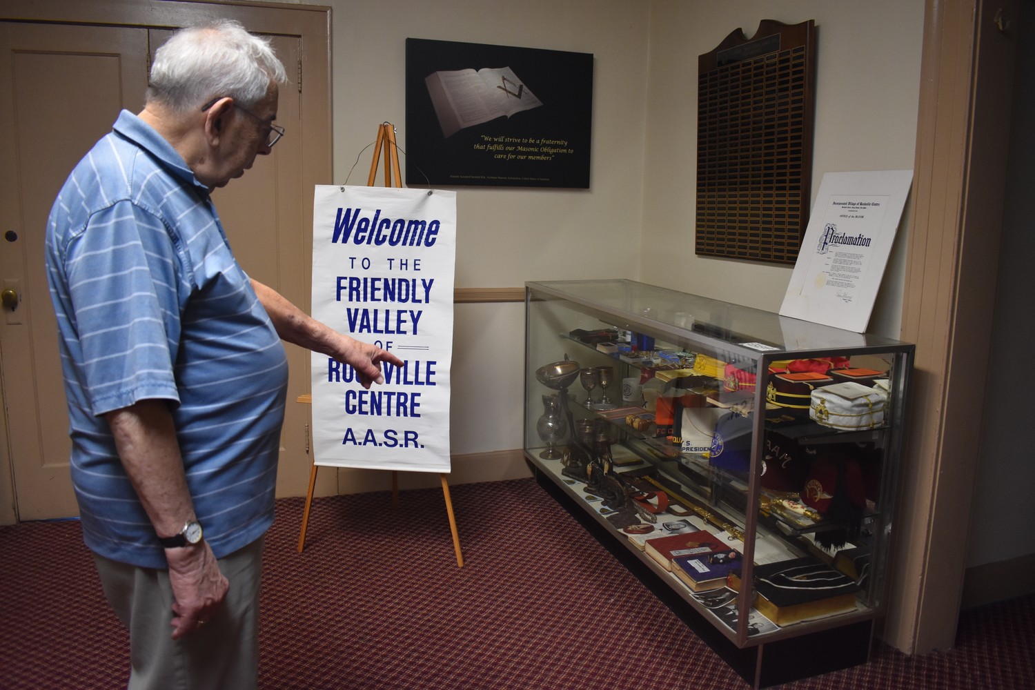 Bob Stack, a freemason for more than 50 years, showed off the display cases he recently filled to preserve the history of fellow members of freemasonry.
