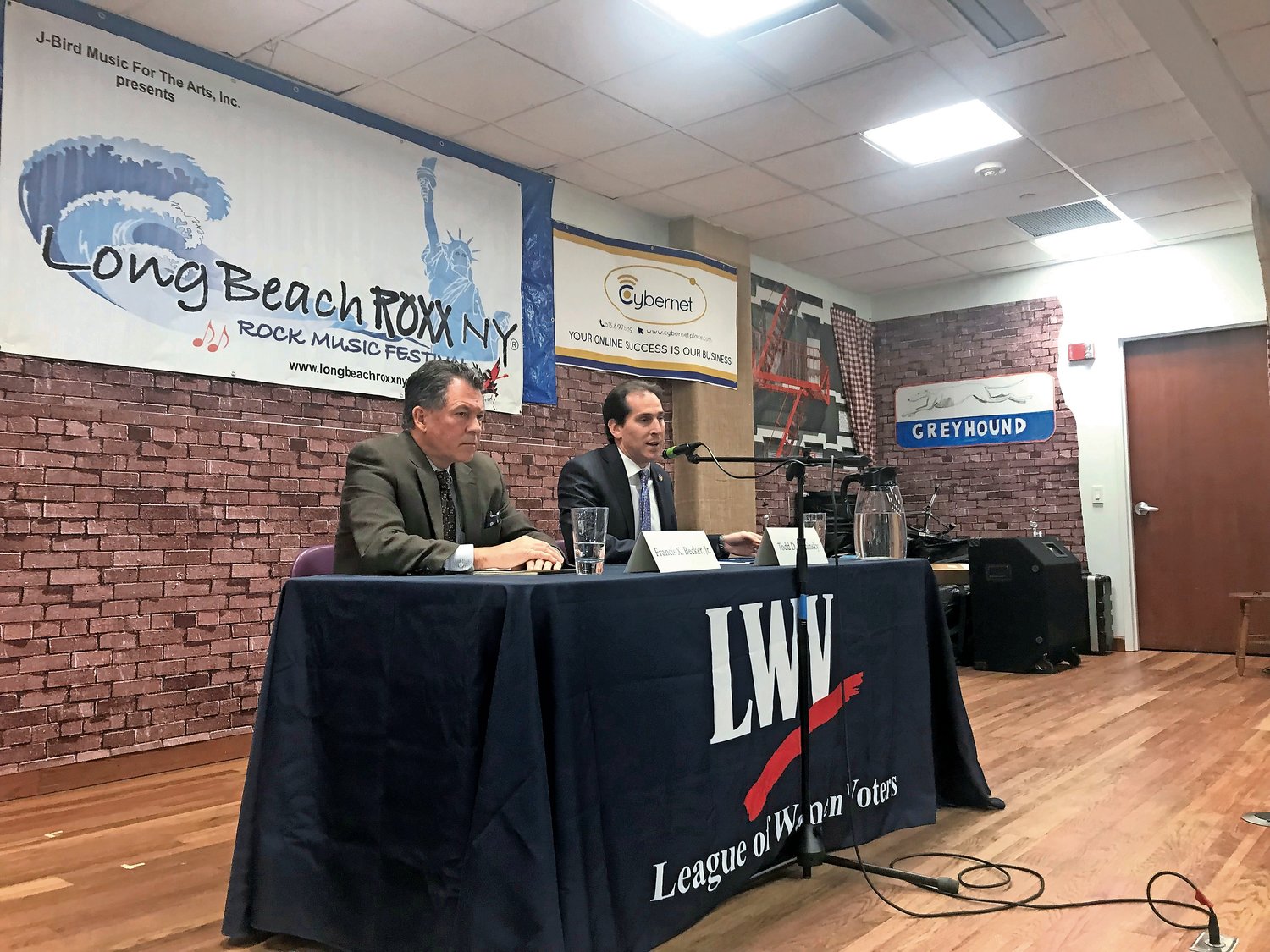 Former Nassau County Legislator Fran Becker, left, is challenging State Sen. Todd Kaminsky for the seat in the 9th Senate District. Both men answered residents’ questions at a candidates forum on Monday at the Long Beach Public Library.