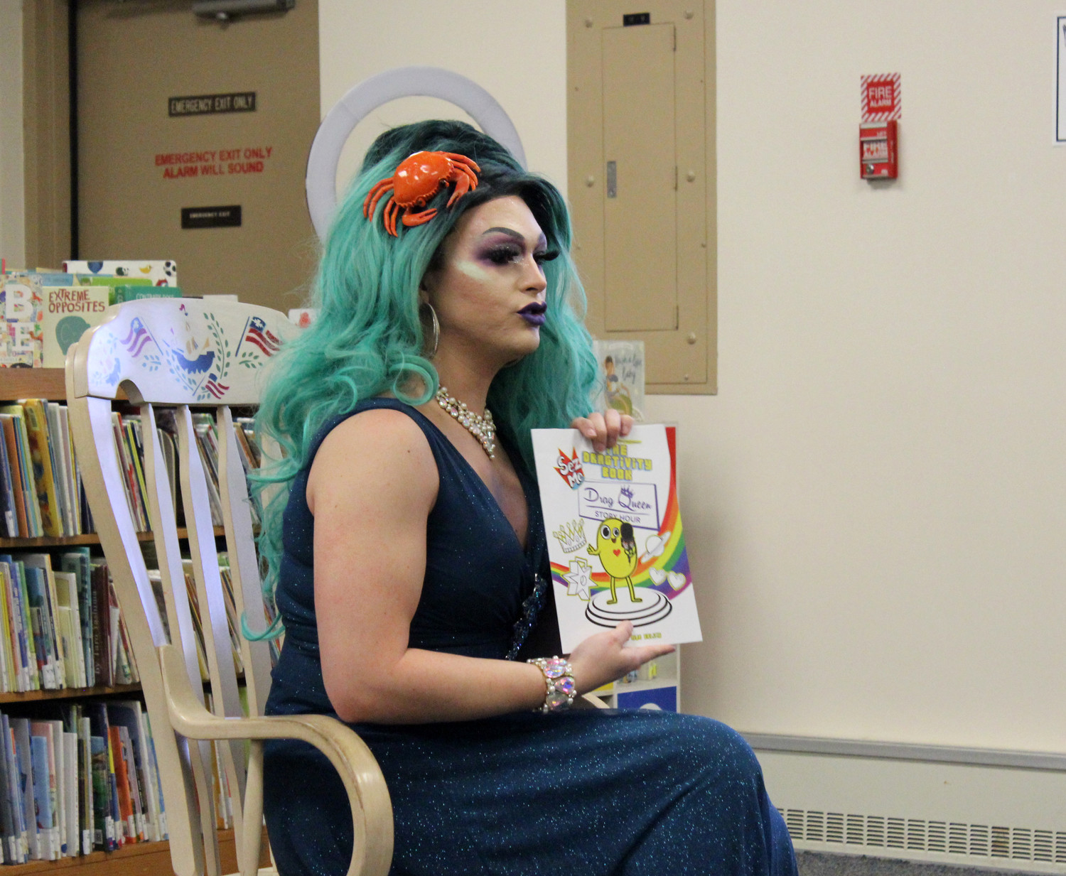 Noche flipped through “The Dragtivity Book,” a coloring book meant to teach children about gender nonconformity, she said.