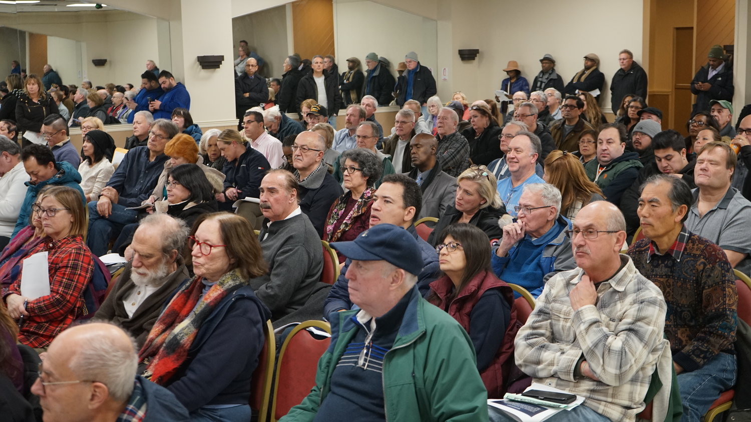 More than 100 residents crowded the Valley Stream American Legion on Jan. 9 for a meeting on Nassau County’s tax assessment overhaul.