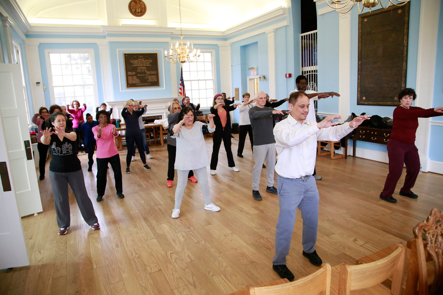 The library’s Tai chi class was full and held in the “original reading room.”