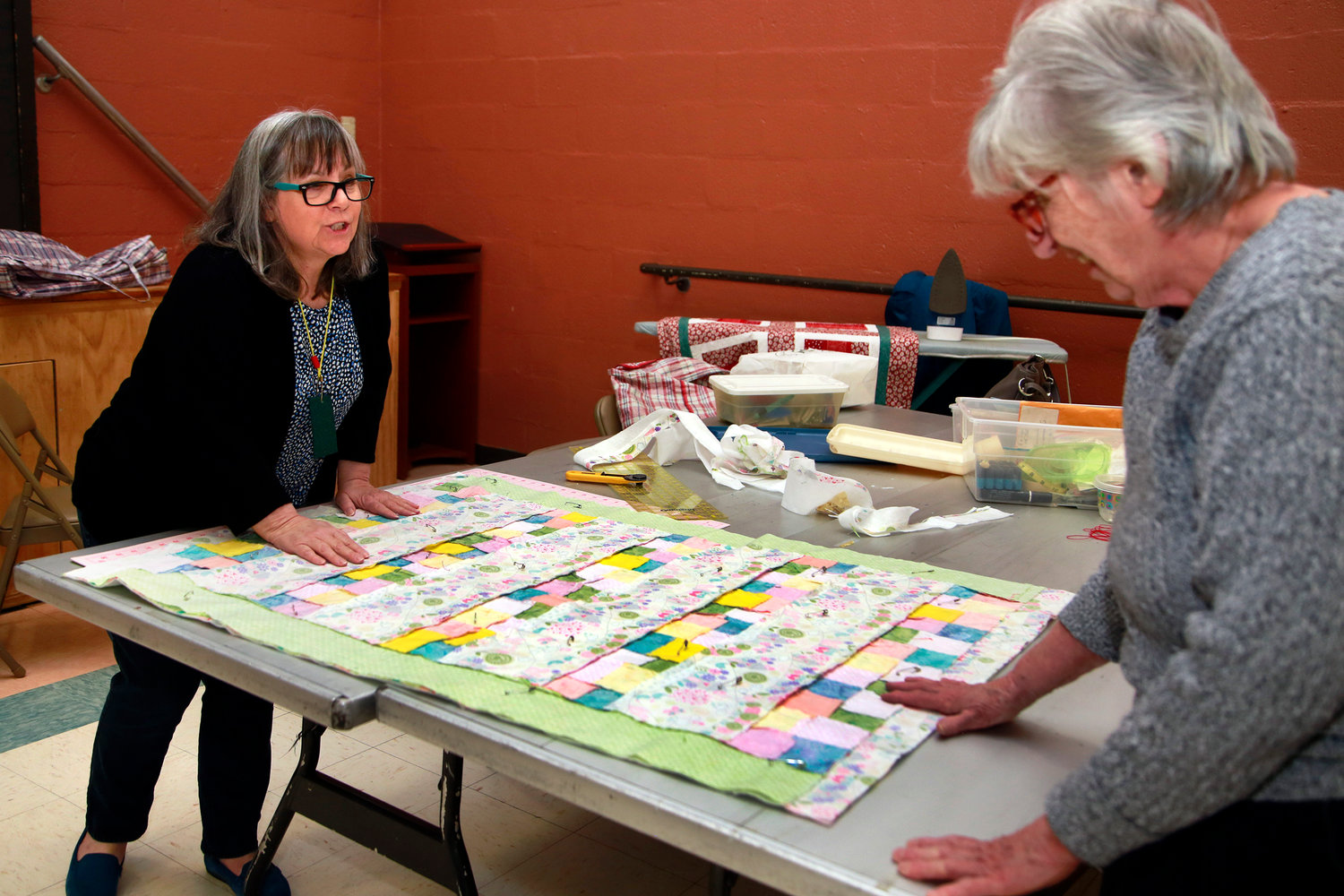 Kim Chiusano and Paula Mazzola worked on a quilt last week.