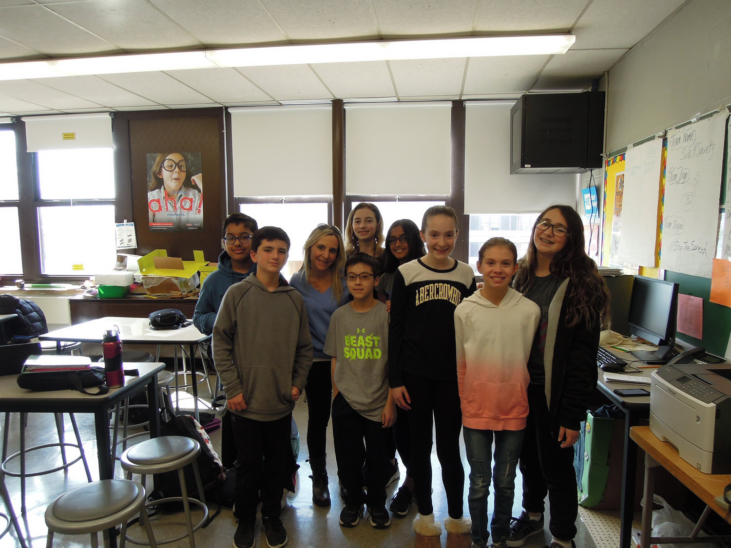 Wantagh Middle School’s EsSCENTial Melts team won $10,000 in the annual Lead2Feed Student Challenge last month for a project addressing the mental health needs of their schoolmates and community. Teacher Patti Andreolas was third from left.