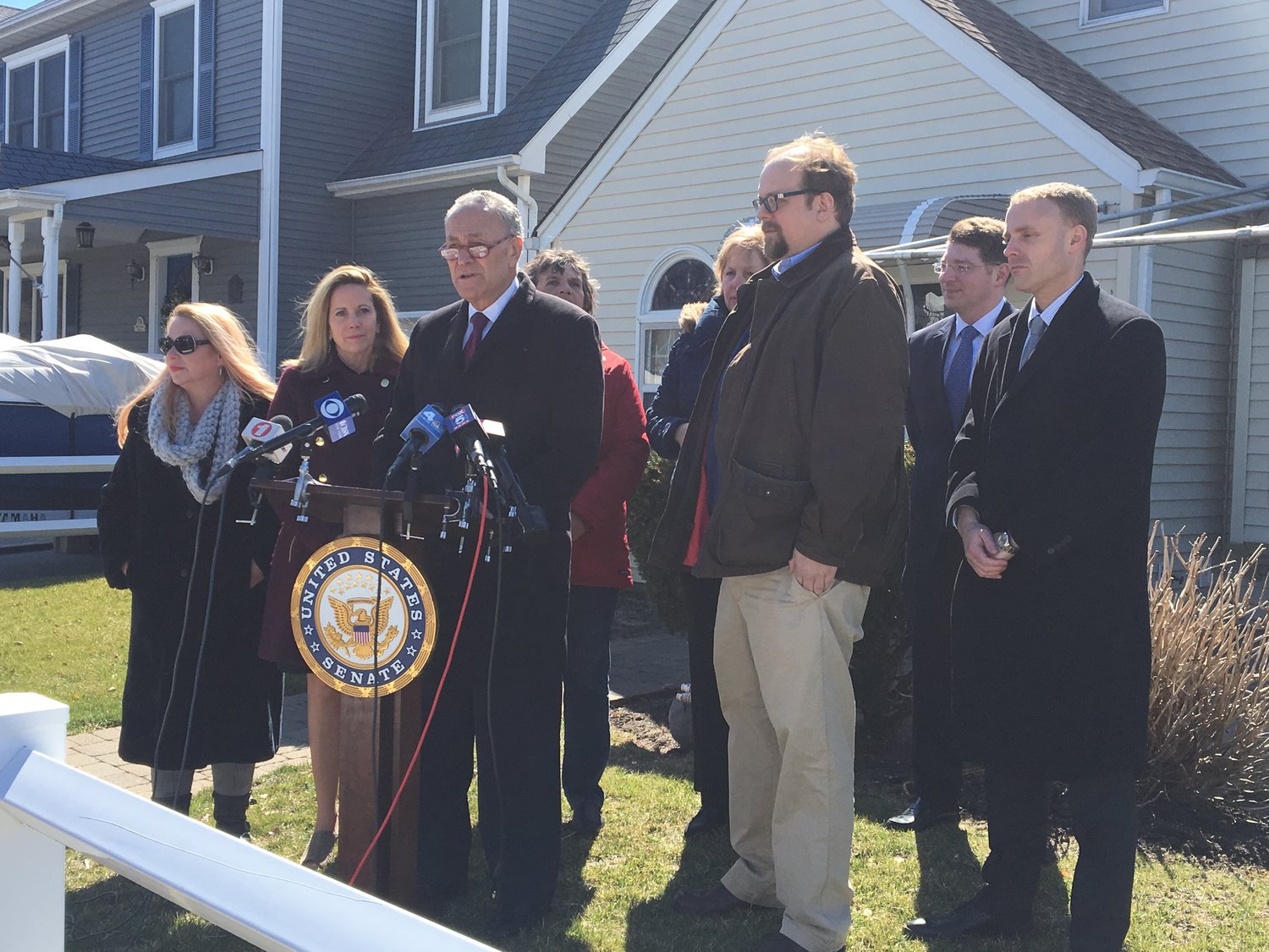 U.S. Sen. Charles Schumer was joined by residents and other elected officials in Long Beach on Monday to call on the Federal Emergency Management Agency to reconsider proposed changes to the National Flood Insurance Program.
