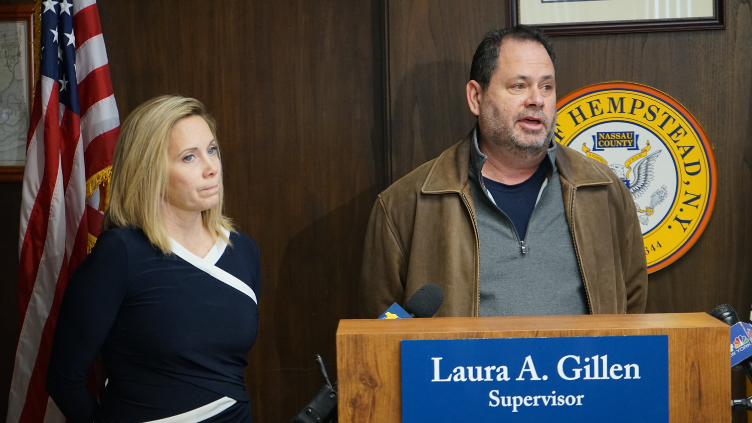 Town Supervisor Laura Gillen with Oceanside homeowner Michael Cascio in January. Cascio was told five years after Hurricane Sandy that he needed to elevate his house because of damage it sustained during the storm.