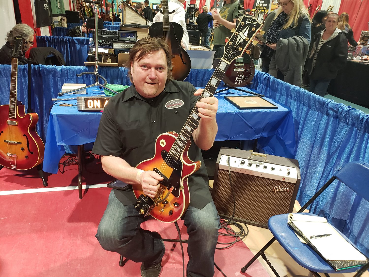 Kevin Goode, of Babylon, played one of the Les Pauls on display.
