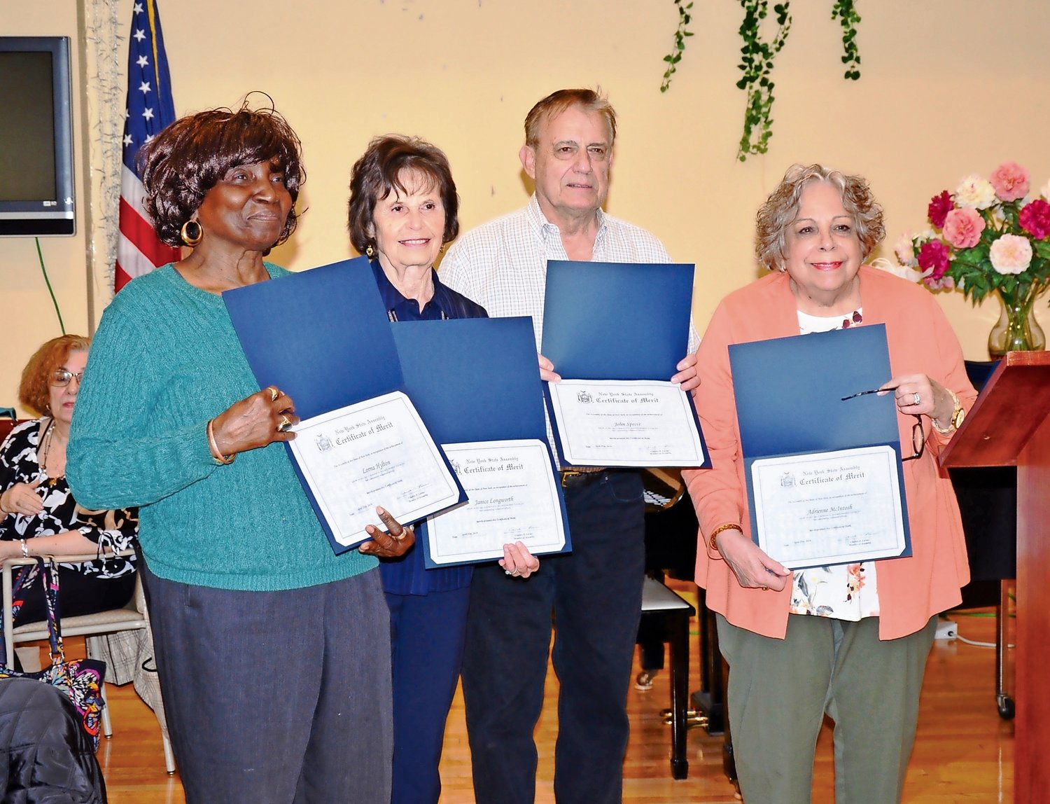 It was a proud day for Lorna Hylton, left, Janice Longworth, John Speece and Adrienne McIntosh, who were recognized for their volunteerism.