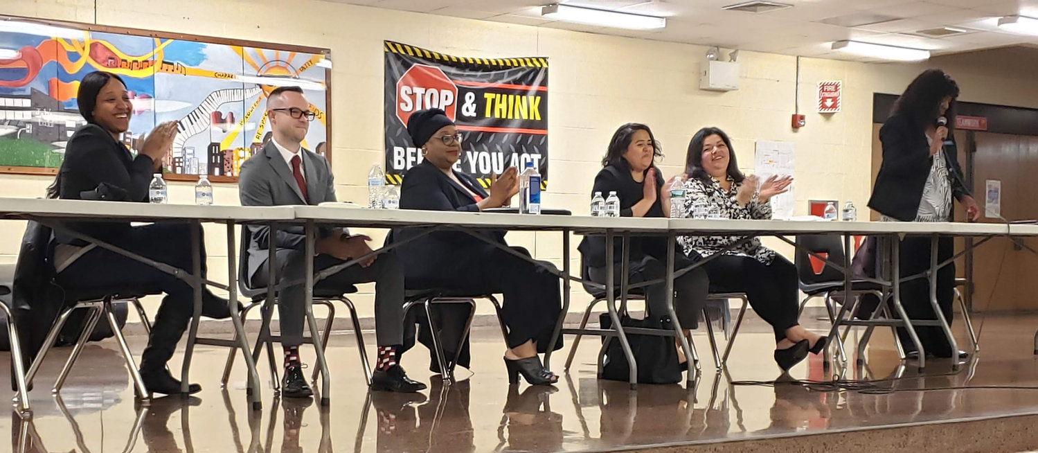 The Nassau County Region PTA moderate a "Meet the Candidates" forum at J.W. Dodd Middle School on May 1. Candidates, from left Tanyira Taylor, Jeremy Impellizeri, Sophia Johnson, Gabriela Castillo and Maria Jordan-Awalom answered community questions and concerns collected and asked by Kimberly Bell, far right.