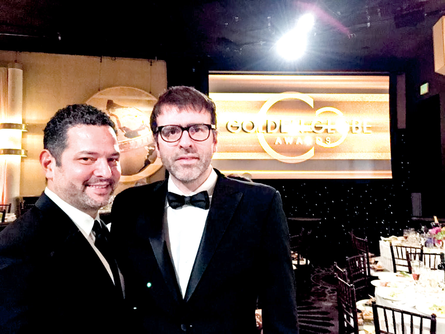 Dinelaris, near right, attended the 2015 Golden Globe Awards with his writing partner, Nicholas Giacobone.
