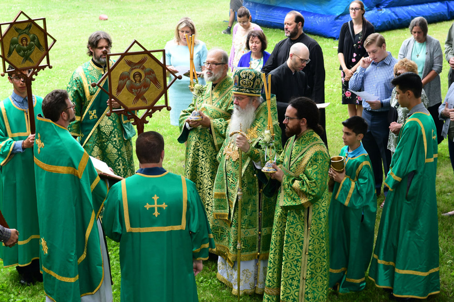 Metropolitan Tikhon, flanked by Subdeacon Alexis Liberovsky, left, and Subdeacon Nilus Klingel during the outdoor gospel reading.