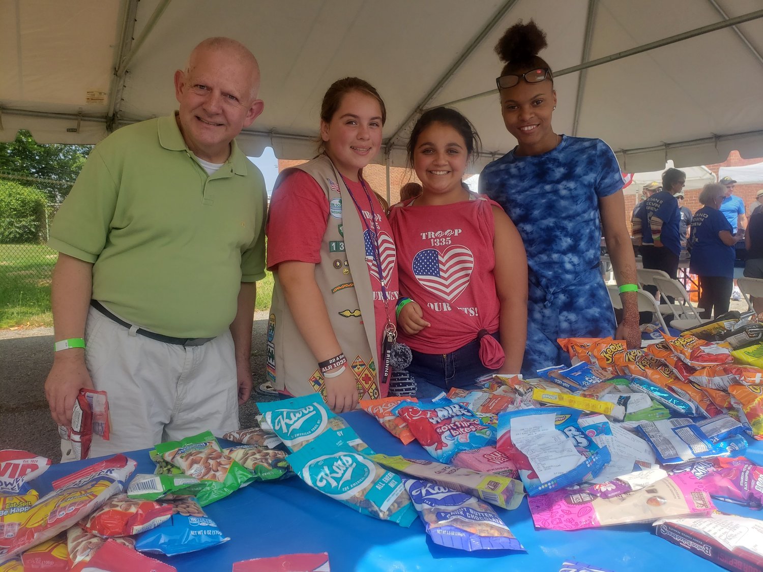 Elmont Girl Scout Troop 1335 and Freeport AHRC Nassau volunteers, from left, Ralph Gilloon, Natalie Becker, Sammy Vacchian and Neffertiti Dolce.