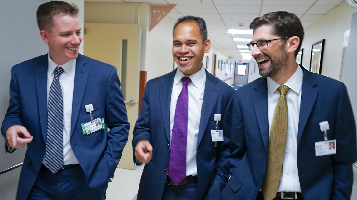 Seligman, far right, with Chris O’Brien, far left, senior director of financial operations at LIJ Valley Stream, and Jason Tan, deputy executive director of administration.