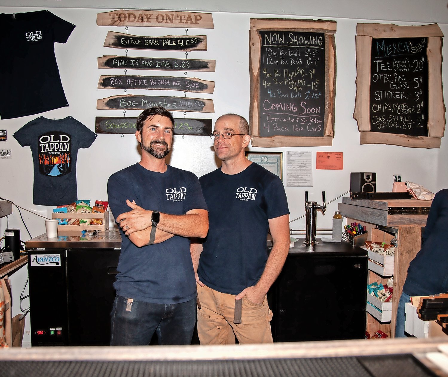 Brent Kunkle, left, and Matthew Cryan, co-owners of Old Tappan Brewing Company at their grand opening on July 12.