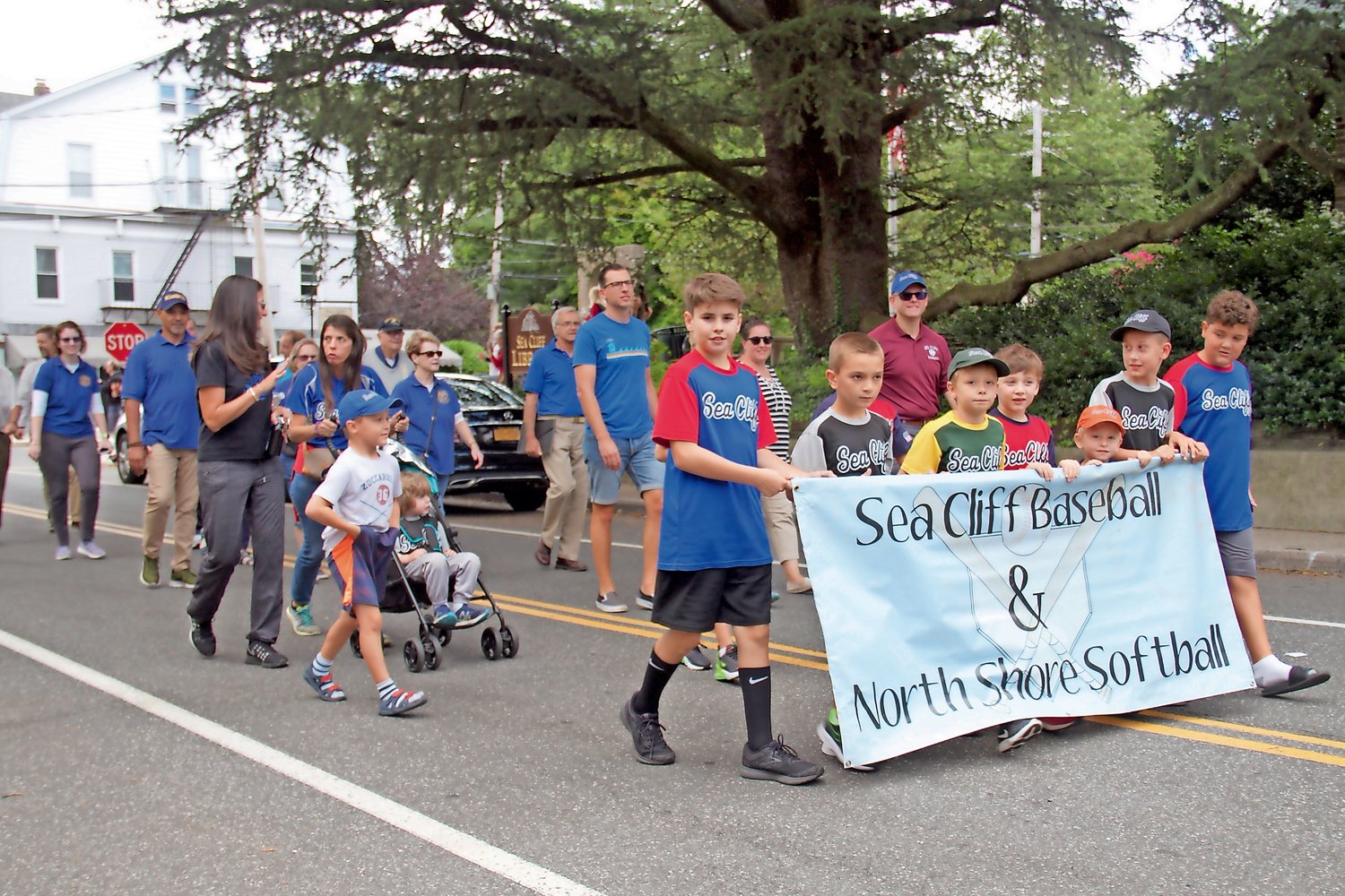 The Sea Cliff Baseball and North Shore Softball teams were among the marchers.
