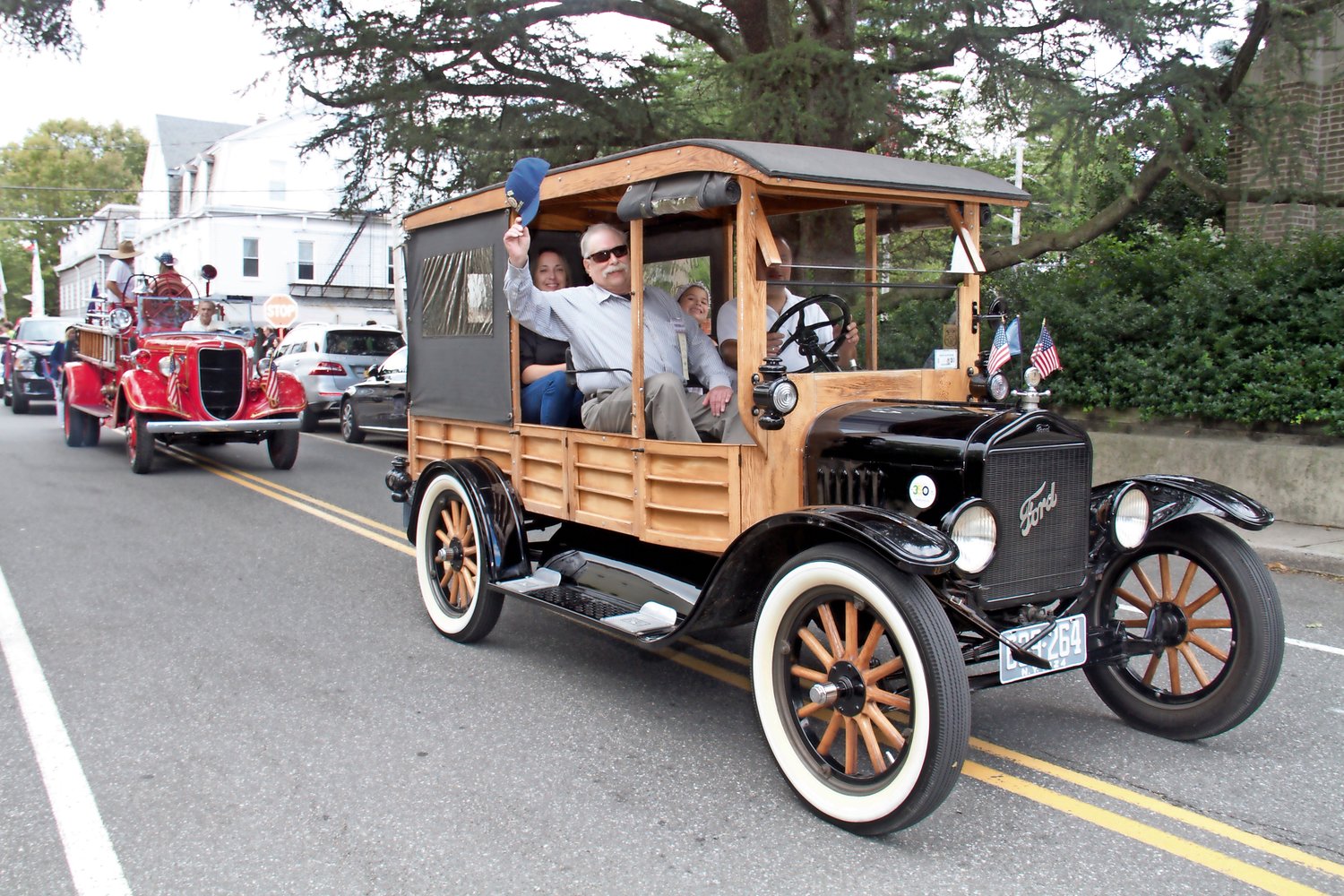 Veteran James Foote rode in an antique Model-T Ford.
