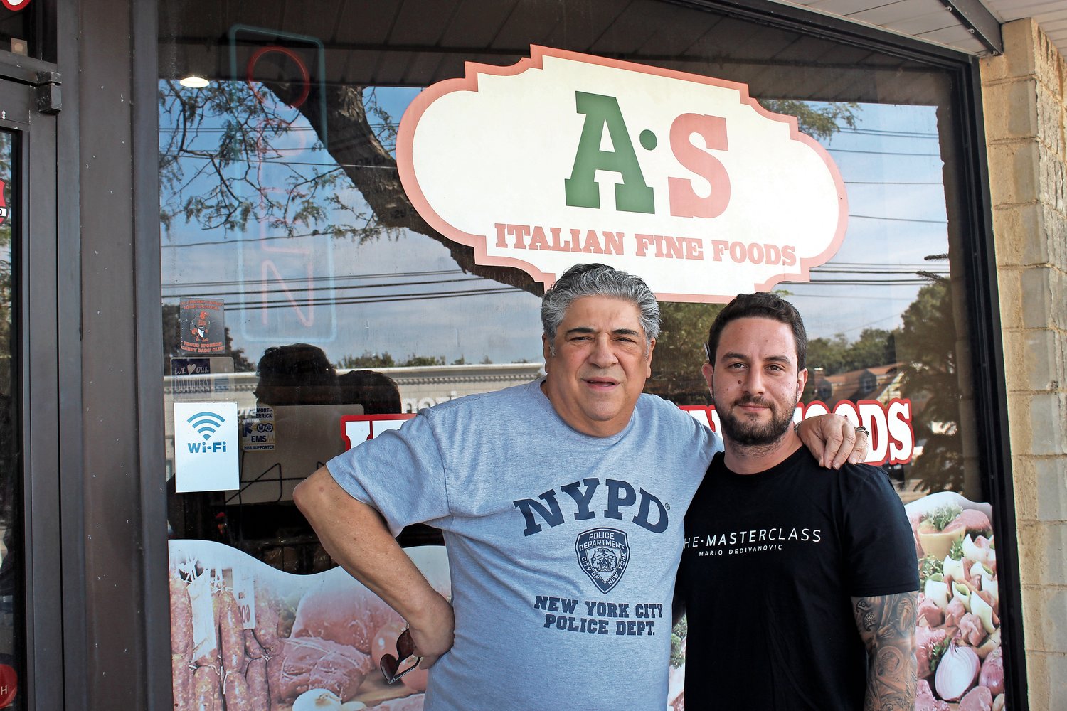 “Sopranos” star Vincent Pastore, left, joined Anthony Giordano, the owner of A&S Fine Foods in Merrick, to promote their new tomato sauce, which will be sold at the store starting next month.