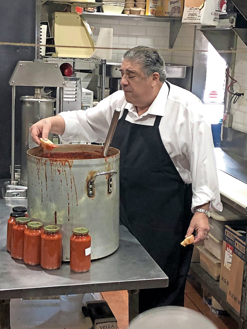 Pastore cooked up a sampling of his tomato sauce in the kitchen of A&S Fine Foods in Merrick.
