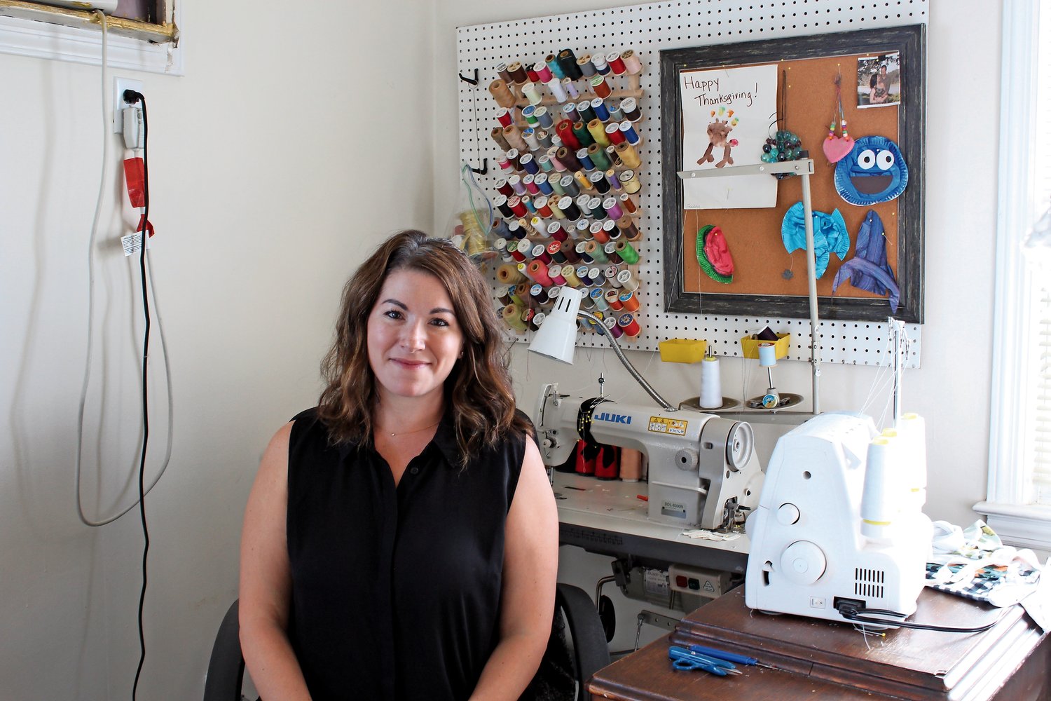 Cat Munzing, a Lynbrook native who now lives in Oceanside, is making a name for herself as a dressmaker.