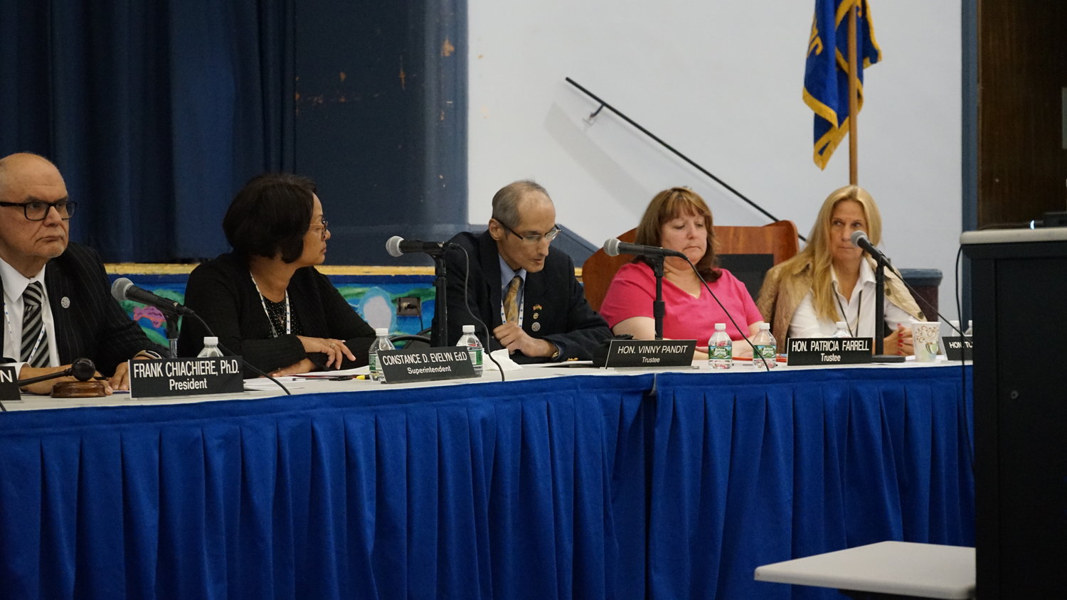 District 13 School Board Trustee Vinny Pandit, second from left, is under fire for comments he made on Facebook that members of the Hispanic community considered racist.