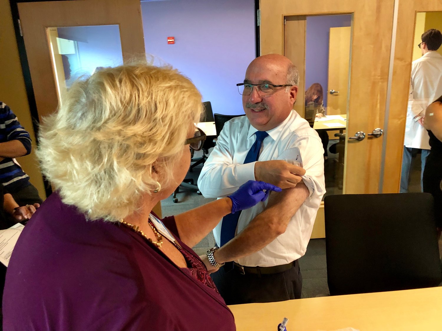 Marty Goldenberg, advertising sales account executive for the Rockville Centre Herald, received his shot from Kate Zummo, MSSN director of community education and a registered nurse.
